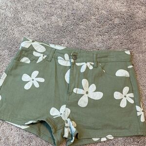 Green and white floral shorts